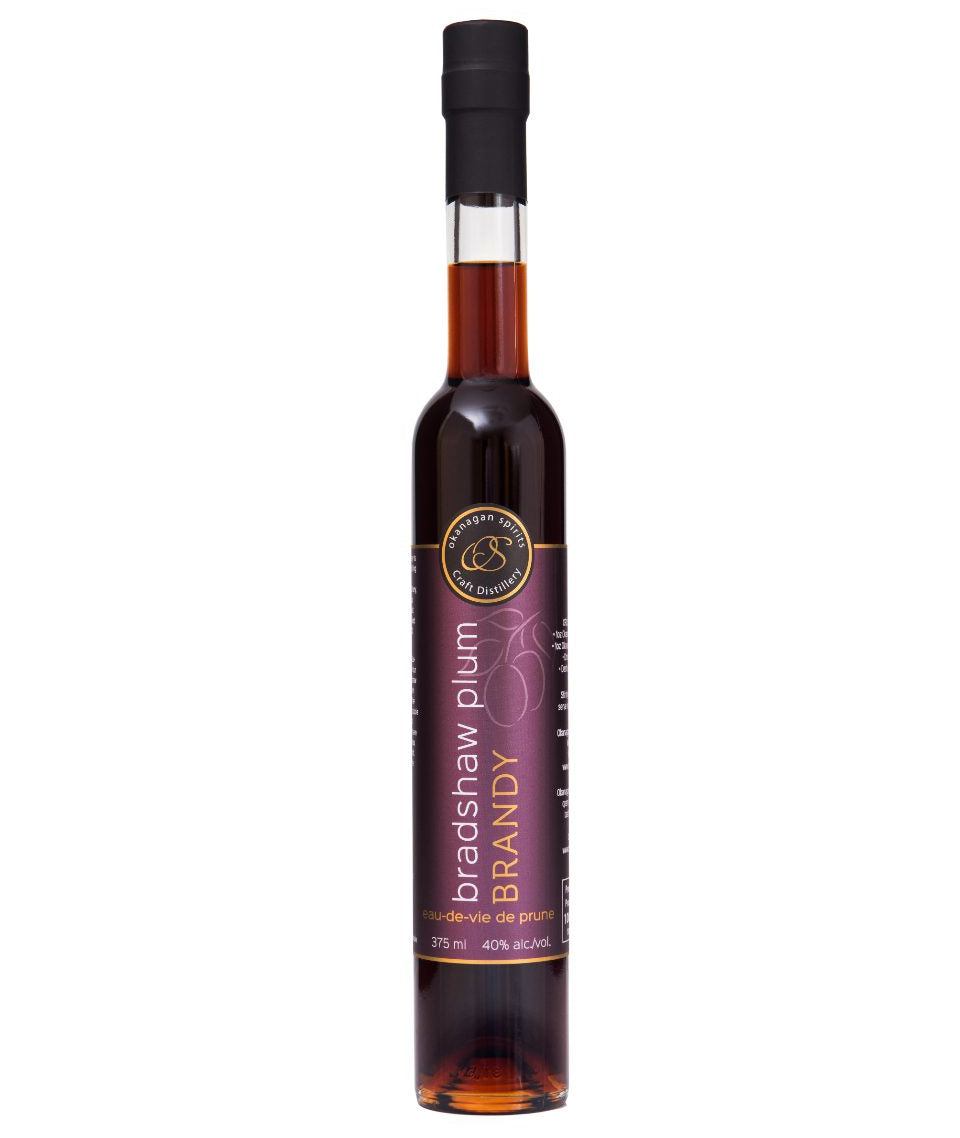 Bottle of Bradshaw Plum Brandy on a white background