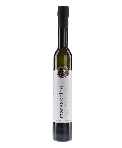 Bottle of Maraschino liquor on a white background